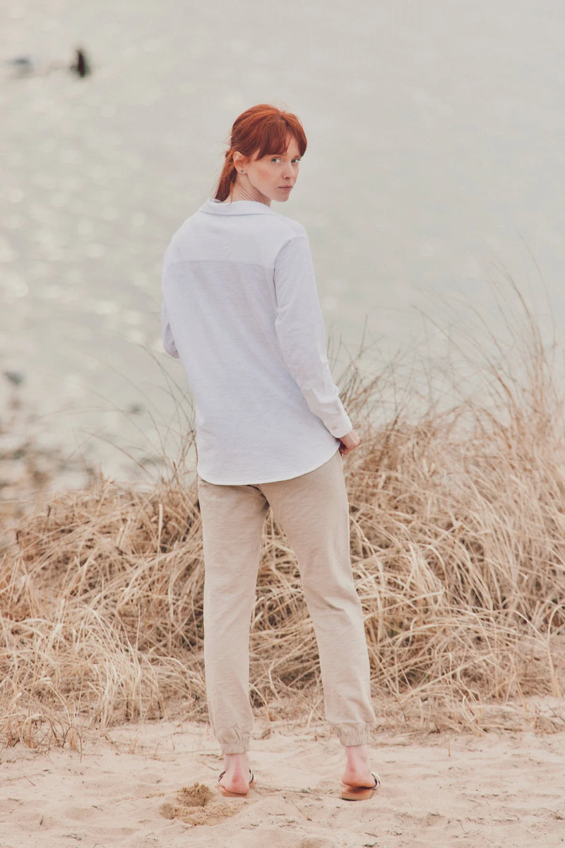 Back view of a model wearing the Emmit Button-Down Slub