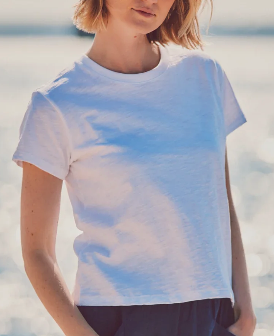  a model in a white slub tee