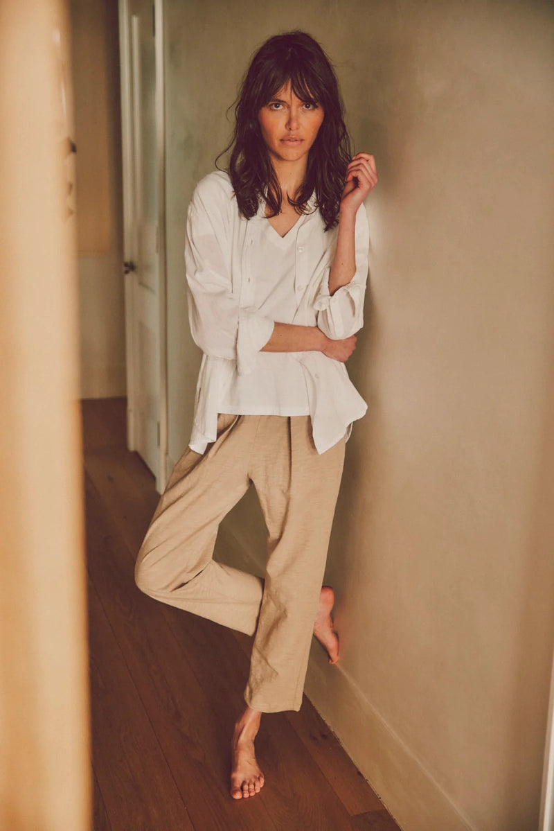 model wearing beige sunset pants