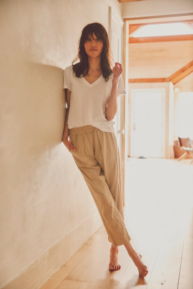 model wearing sunset pants with a white tee