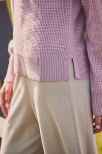 up-close view of a pink sweater